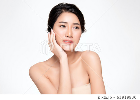 Beautiful Young Asian Woman with Clean Fresh Skin. Face care, Facial treatment, Cosmetology, beauty Beautiful Young Asian Woman with Clean Fresh Skin. Face care, Facial treatment, Cosmetology, beauty 63919930
