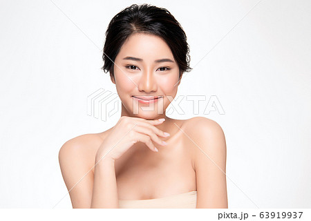Beautiful Young Asian Woman with Clean Fresh Skin. Face care, Facial treatment, Cosmetology, beauty Beautiful Young Asian Woman with Clean Fresh Skin. Face care, Facial treatment, Cosmetology, beauty 63919937