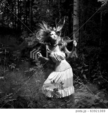 Girl in fairy forest Girl in fairy forest 63921369