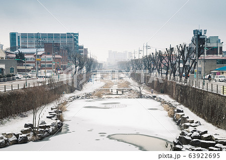 Snow covered town and river at winter in Suwon, Korea 63922695