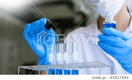 scientists researching in laboratory in white lab 63922993