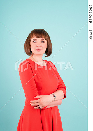 Cheerful confident business woman isolated over 63924009