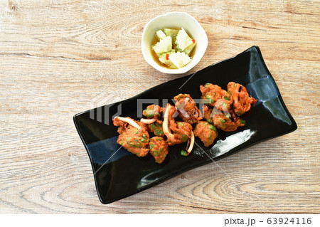 fried fish patty and squid dipping with sweet sauce 63924116