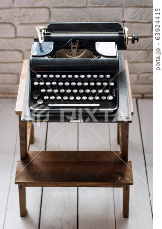 Antique typewriter. Vintage typewriter machine Antique typewriter. Vintage typewriter machine 63924415