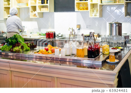 Food at restaurant kitchen. Chef checking meal Food at restaurant kitchen. Chef checking meal 63924481