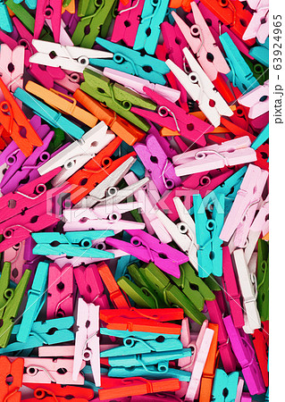 Colorful Wooden clothespins close-up as texture 63924965