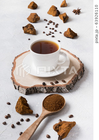 Chaga infusion beverage in cup. Trendy Russian Chaga infusion beverage in cup. Trendy Russian 63926110