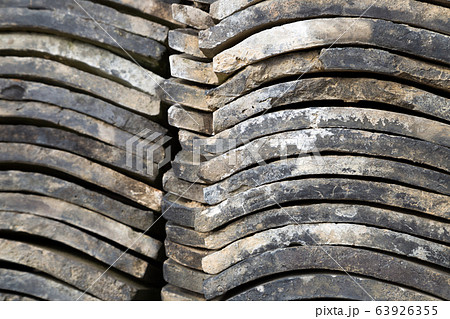 Piled tile roof background 63926355