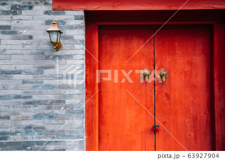 Chinese traditional house, Old brick wall and red door 63927904