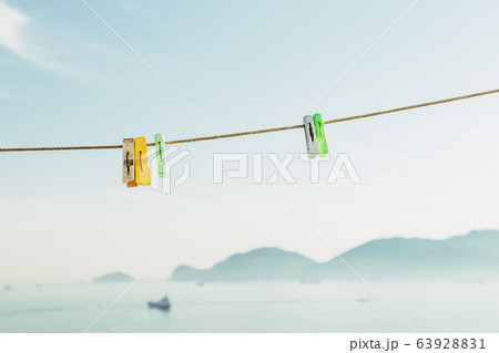 Colorful clothes pegs with sea at Huinnyeoul Culture Village in Busan, Korea 63928831