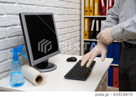 concept of cleaning or disinfecting the office - a 63928870