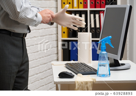 concept of cleaning or disinfecting the office - a 63928893