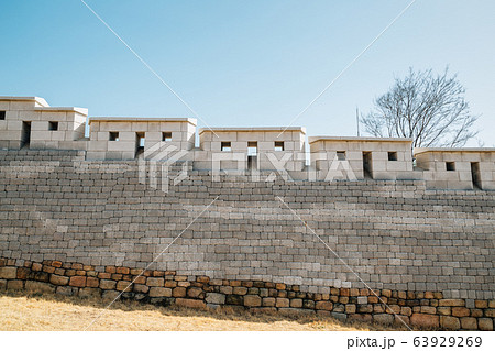 Korean traditional fortress stone wall in Seoul, Korea Korean traditional fortress stone wall in Seoul, Korea 63929269