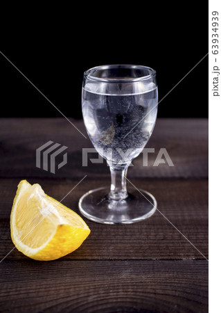 vodka shot with lemon 63934939