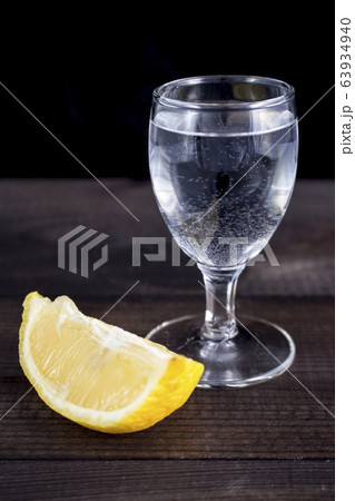 vodka shot with lemon 63934940