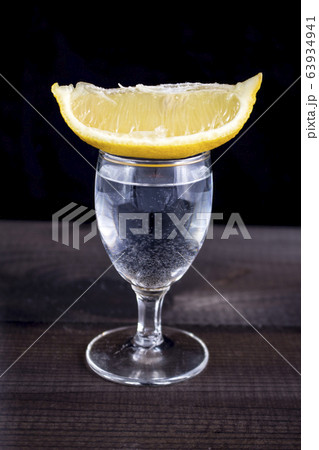 vodka shot with lemon 63934941