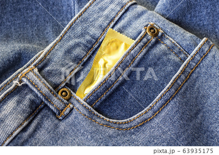condom in jeans pocket 63935175