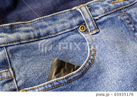 condom in jeans pocket 63935176