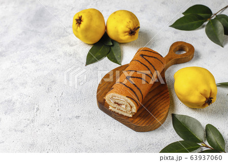 Quince jam cake roll with fresh organic quinces Quince jam cake roll with fresh organic quinces 63937060