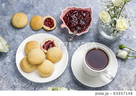 Homemade delicious cookies serving with raspberry jam,top view 63937148
