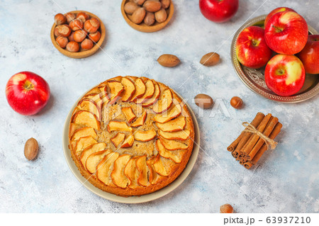 Sweet homemade apple cake with cinnamon 63937210