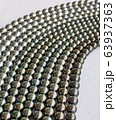 Black South Sea Pearl strands. 63937363