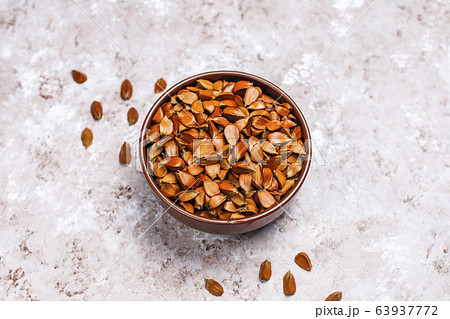 Beech nuts on light background,top view Beech nuts on light background,top view 63937772
