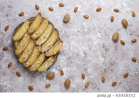 Italian tuscan traditional cookies cantuccini with almonds on light background,top view Italian tuscan traditional cookies cantuccini with almonds on light background,top view 63938352