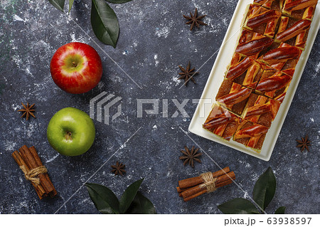 Homemade apple pie slices on dark background,top view Homemade apple pie slices on dark background,top view 63938597