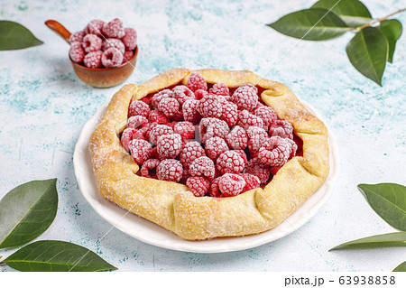 Open pie, raspberry galette. Summer berry dessert. Open pie, raspberry galette. Summer berry dessert. 63938858