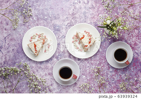 Italian tuscan traditional cookies cantuccini with almonds ,a cup of coffee on light background,top view Italian tuscan traditional cookies cantuccini with almonds ,a cup of coffee on light background,top view 63939324