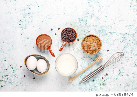 Cupcake baking background with kitchen utensils. 63939474