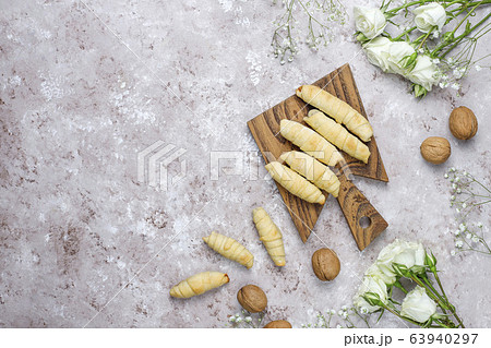 Traditional Azerbaijan holiday Novruz cookies mutaki on white plate on light background 63940297