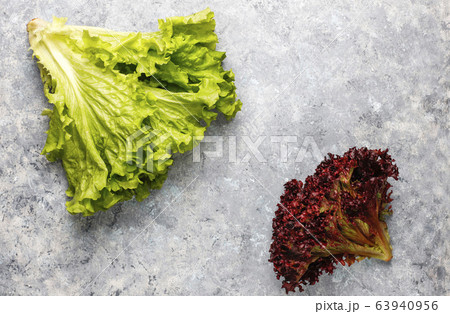 Fresh red lettuce on grey concrete background,top view 63940956