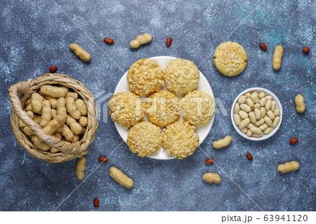 Homemade crunchy cookies with peanuts on grey background,top view 63941120