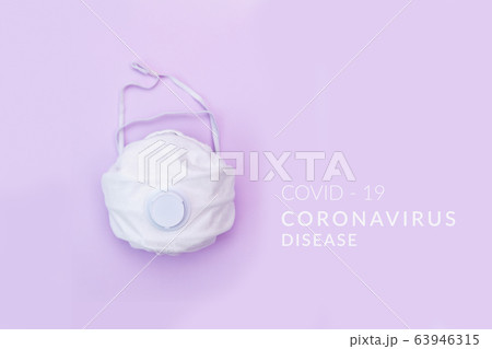 White medical mask on color background. A protection against pollution, virus, flu and coronavirus 63946315
