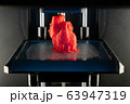 3d printer prints the model of heart, process of printing organs on a 3d printer, creating a model of the human heart. 63947319