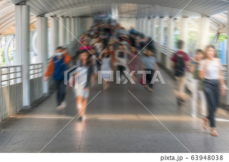 Blurred crowd of unrecognizable business people walking in modern subway interexchange in rush hour working day, blur business and transportation, lifestyle and leisure concept, Blurred crowd of unrecognizable business people walking in modern subway interexchange in rush hour working day, blur business and transportation, lifestyle and leisure concept, 63948038