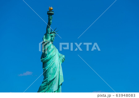 The Statue of Liberty under the blue sky background, Lower Manhattan, New York City, Architecture and building with tourist concept 63948083