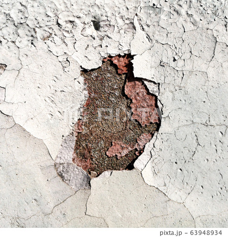 Stucco cracked on the wall as abstract background 63948934