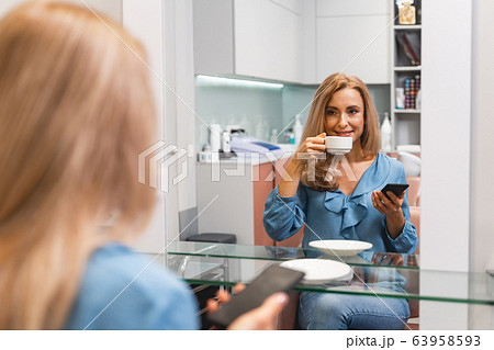 Portrait of attractive girl that enjoying her drink 63958593