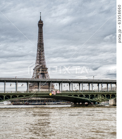 Eiffel Tower on a cloudy day - Paris, France Eiffel Tower on a cloudy day - Paris, France 63958660
