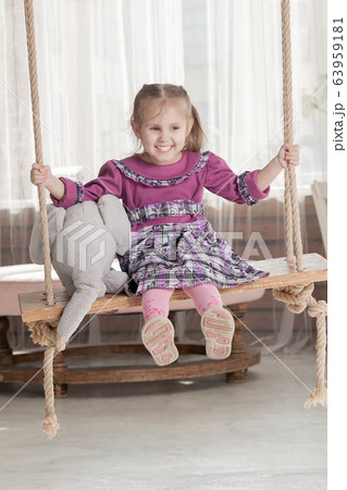 portrait of a three year old smiling little girl portrait of a three year old smiling little girl 63959181