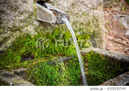 Source of underground clean ionized and ozone water in the mountains of Monchique. Portugal Algarve 63959244