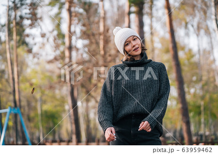 Emotion photo. Cute white emotional caucasian girl in the park Emotion photo. Cute white emotional caucasian girl in the park 63959462