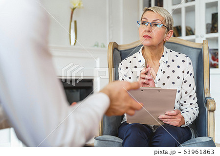 Focused psychoanalyst assessing her clients mental health Focused psychoanalyst assessing her clients mental health 63961863