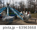 Carousels closed due coronavirus COVID-19 quarantine in the city park with nobody, all people at home 63963668