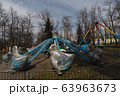 Carousels closed due coronavirus COVID-19 quarantine in the city park with nobody, all people at home 63963673