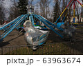 Carousels closed due coronavirus COVID-19 quarantine in the city park with nobody, all people at home 63963674