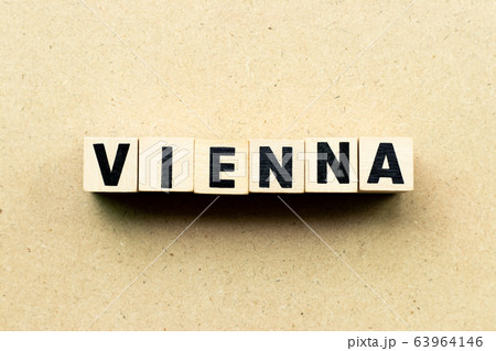 Letter block in word Vienna on wood background Letter block in word Vienna on wood background 63964146